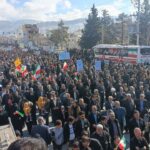 ترسیم پرچم پر افتخار جمهوری اسلامی ایران برچهره راهپیمایان ۲۲ بهمن در ایلام